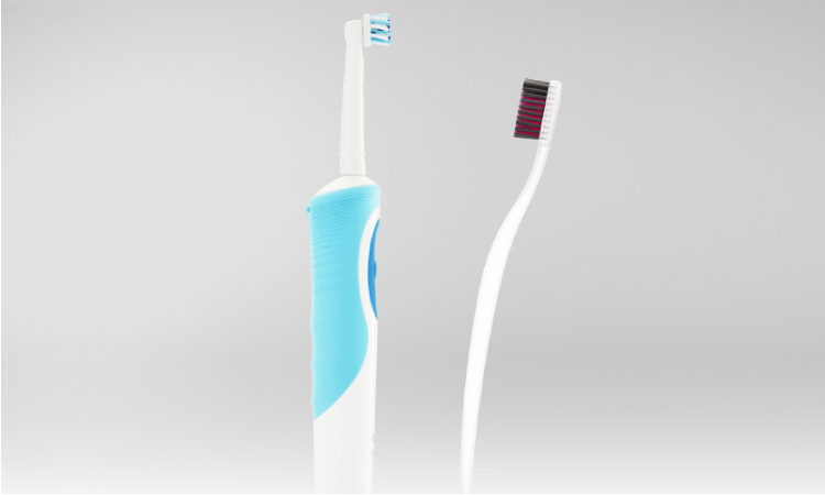 electric vs traditional toothbrush faceoff